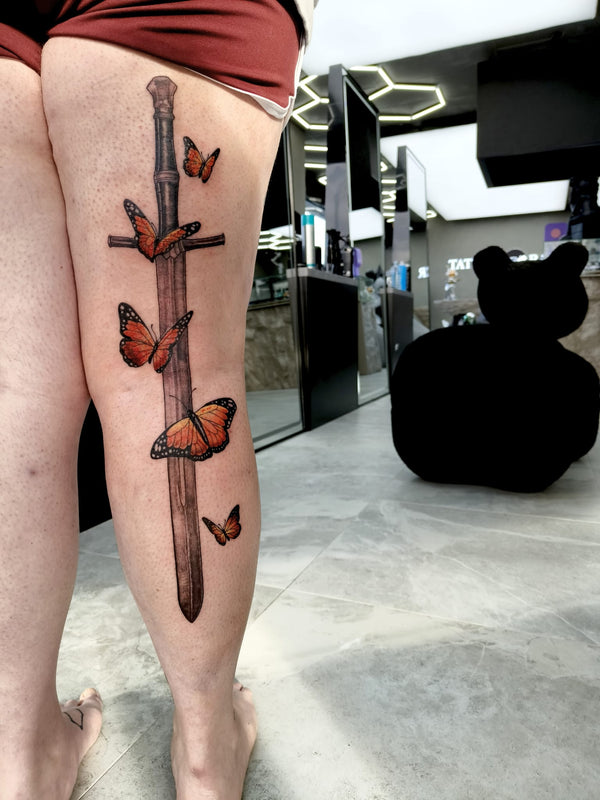 butterfly leg tattoos - melbourne
