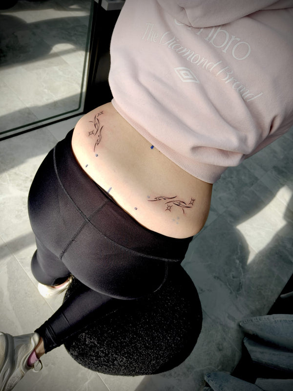 lower back tattoos - sam ink melbourne