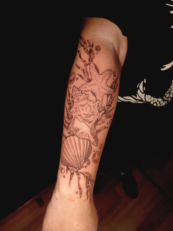 sea inspired tattoo melbourne